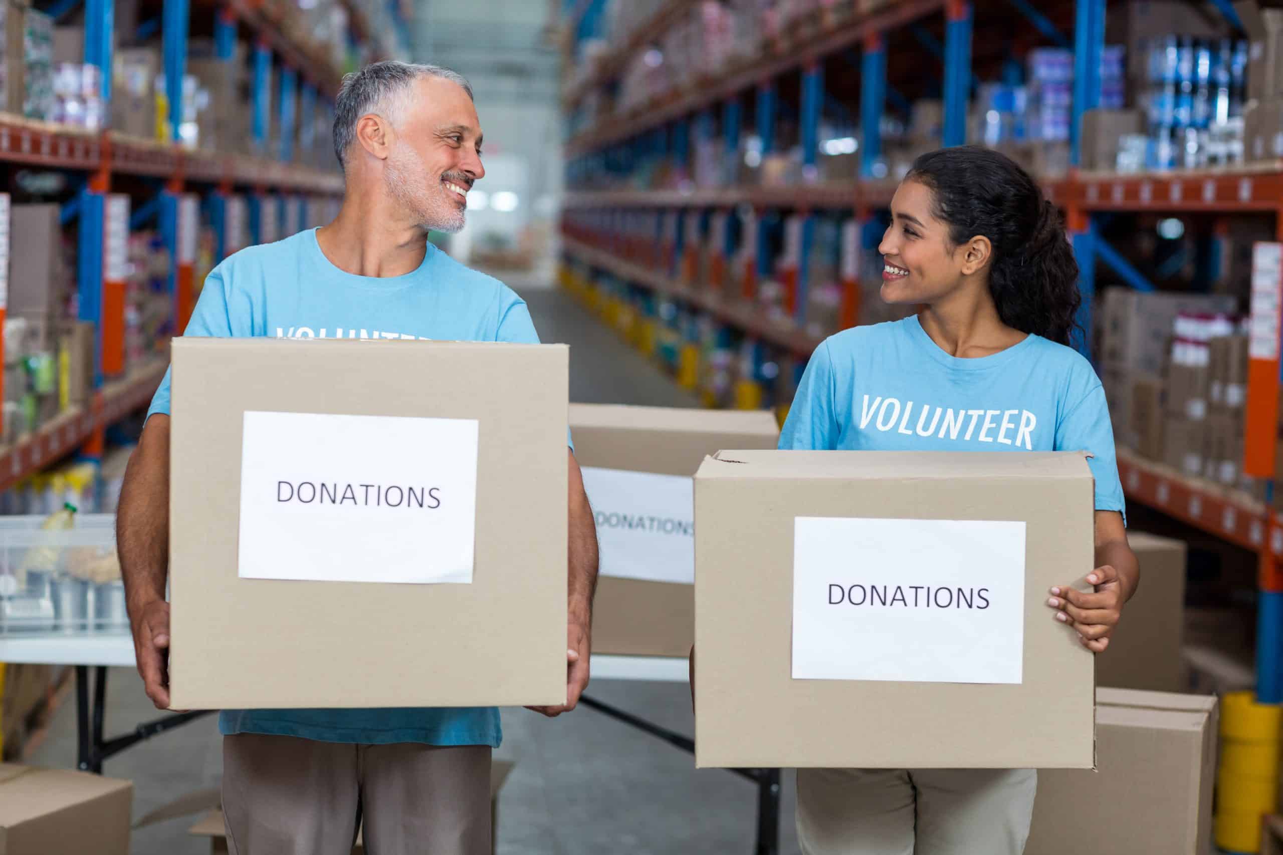 image of 2 people serving others