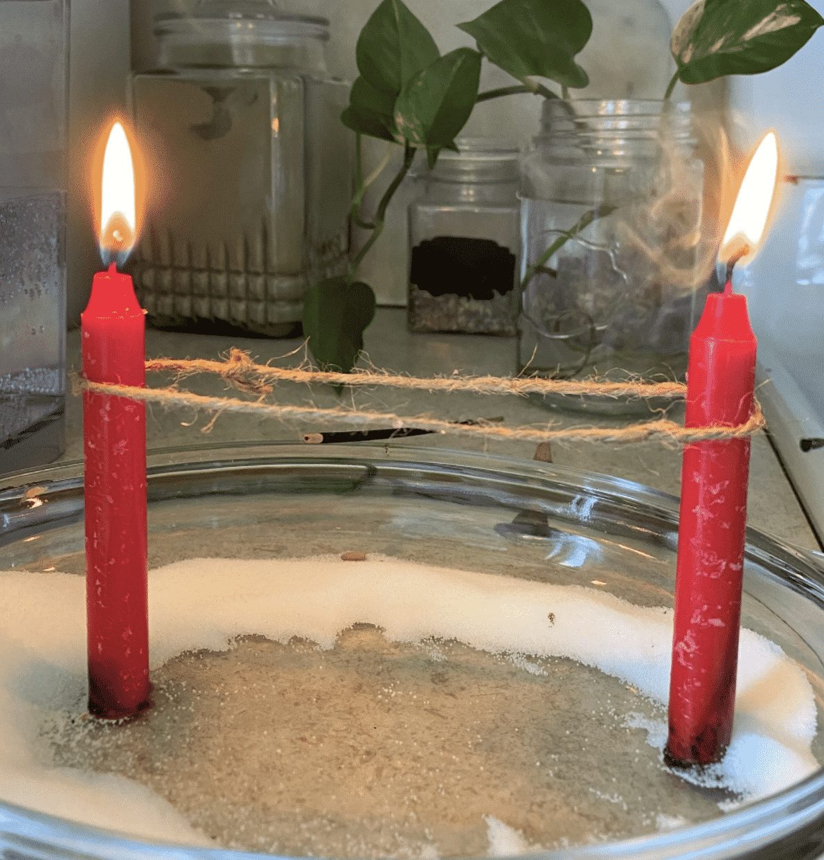 image of two cord cutting candles